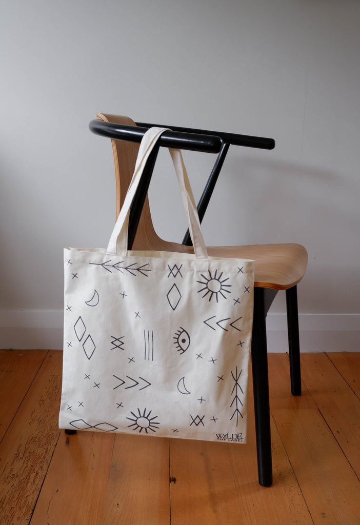 Everyone needs an easy tote bag in their life! Such a handy reusable style to fold up in your hand bag and grab when you need.   Made from 100% Organic Cotton   Size: Approx 40cm x 40cm
